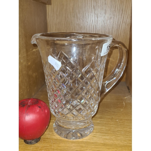 154 - A stunning large Waterford Crystal Large Whiskey water pitcher jug. In good order with acid mark to ... 