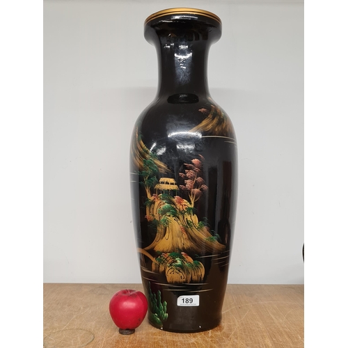 189 - A tall Japanese vase with hand painted imagery of traditional scenes.