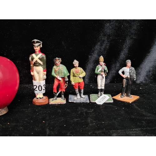 203 - A selection of five vintage die cast collectible soldiers.