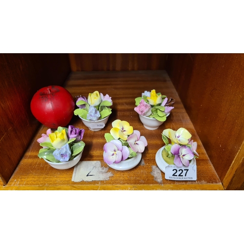 227 - Five miniature pieces of Coalport Bone China in the form of flowers in a plant pot