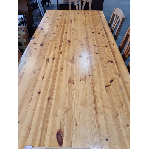 484 - Star lot : A Solid pine long farmhouse dining table with turned legs, accompanied with five matching... 