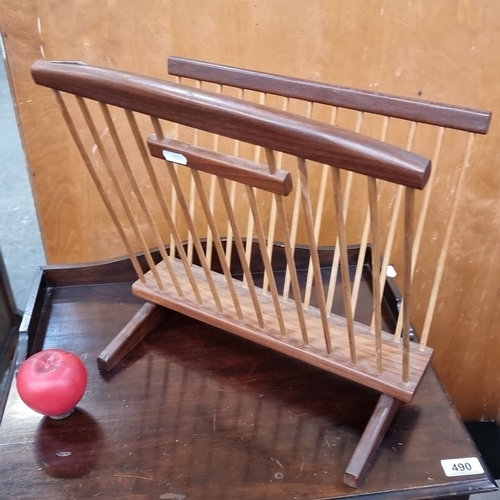 492 - Mid-century modern teak and aframosa spindle side magazine rack.