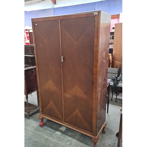 638 - Star Lot: A beautiful Compactom wooden wardrobe with double doors, internal shelving, and hanging sp... 