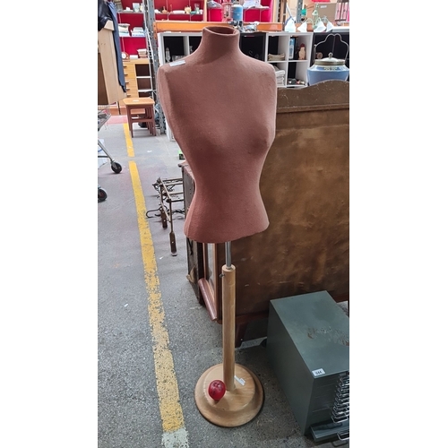 645 - Vintage adjustable dress form mannequin with a cloth-covered fiberglass torso and a wooden base.