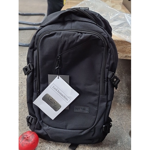 658 - A brand new with tags WENG backpack in black color with a built-in combination lock and ergonomic de... 