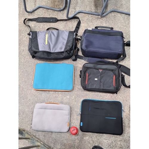 660 - A lot of six laptop bags and sleeves. Includes brands like Dell and various styles and colors such a... 