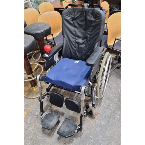 668 - A Rehab classic balance wheelchair with manual features and ergonomic design. Adjustable headrest, p... 