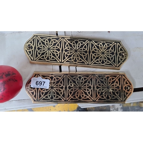 697 - A pair of door plates with intricate Celtic knot design, marked 