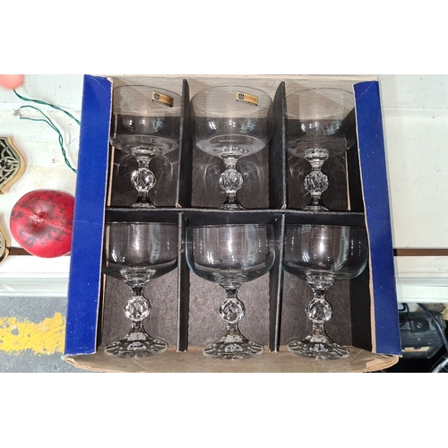 699 - Set of six Claudia Bohemia champagne glasses, featuring elegantly cut glass stems. In original packa... 