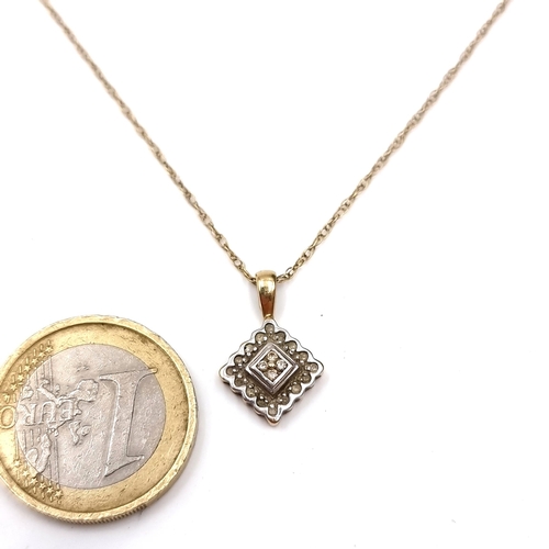 502 - A nine carat gold diamond accented pendant & chain. Length - 46 cms. Weight - 1.89 grams.