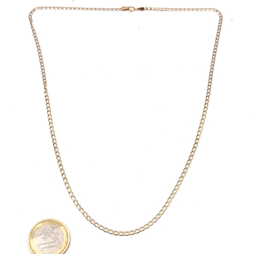 511 - Star lot : A nine carat gold flat curb necklace. Length - 50 cms, Weight - 3.57 grams.