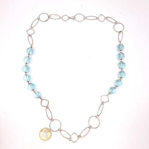 514 - A very nice example of a sterling silver aquamarine facet cut necklace. Length - 72 cms. Weight - 62... 