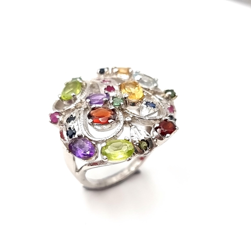 571 - Star lot : A stunning multi-stone ring set with citrine, garnet, amethyst, aquamarine, sapphire & ru... 