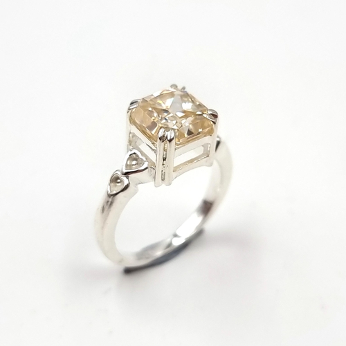 577 - A very nice example of a moissanite stone ring. Ring size - O. Weight - 4.23 grams. Set in Sterling ... 