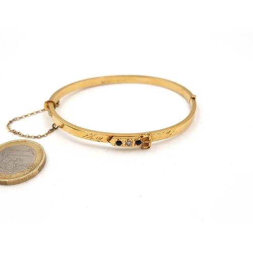 581 - An attractive antique 18 carat gold core bracelet. Set with sapphire and gemstone detailing. Weight ... 