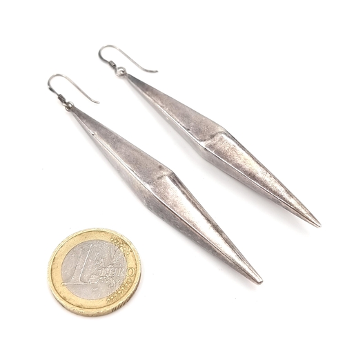 587 - A pair of sterling silver drop tulip earrings suitable for pierced ears. Length - 8 cms. Total weigh... 