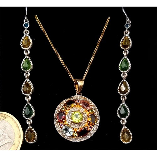 550 - A set of Vary Hue gemstones comprising of a target pendant & chain . Length - 44 cms. Together with ... 