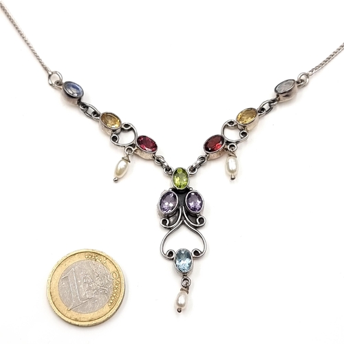 553 - A fabulous drop pendant necklace consisting of citrine, peridot, amethyst, garnet & aquamarine stone... 