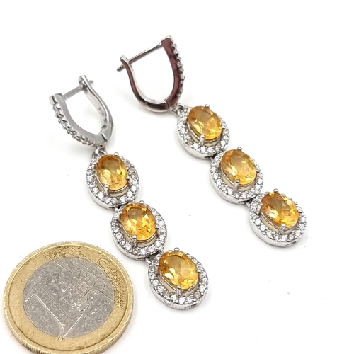 557 - A fabulous pair of citrine stone and gem set mount drop earrings In Sterling Silver. Drop - 5 cms. S... 