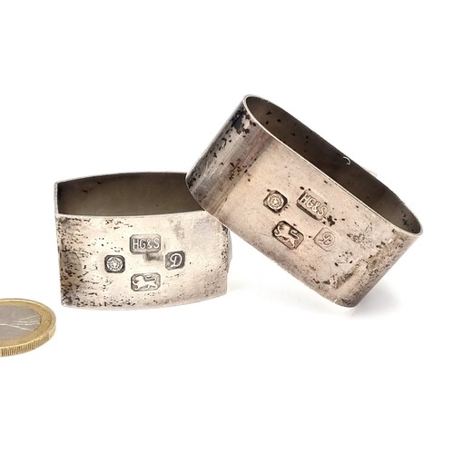 604 - Two sterling silver napkin rings hallmarked Sheffield - 1978. Total weight - 56.55 grams.