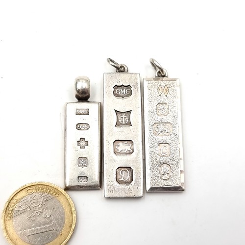 621 - Three silver pendant ingots hallmarked Birmingham. Total weight - 47.4 grams.