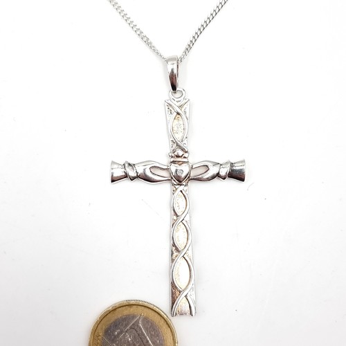 630 - A very nice example of a sterling silver celtic cross and chain. Cross dimensions: 7 x 3.5 cms. Chai... 