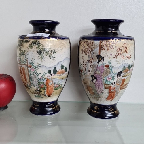 713 - A pair of hand-painted Japanese Satsuma style vases with intricate scenes of geishas and landscape. ... 