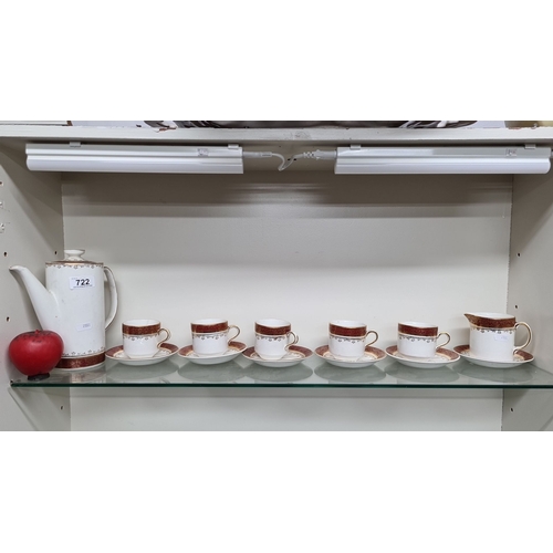 722 - An Arklow tea set , featuring a coffee pot, cream jug, and five teacups with six saucers.