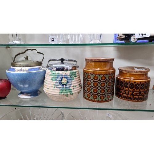 739 - A selection of four vintage ceramic jars, including two Biscuit Jars with Metal Lids and a Hornsea E... 