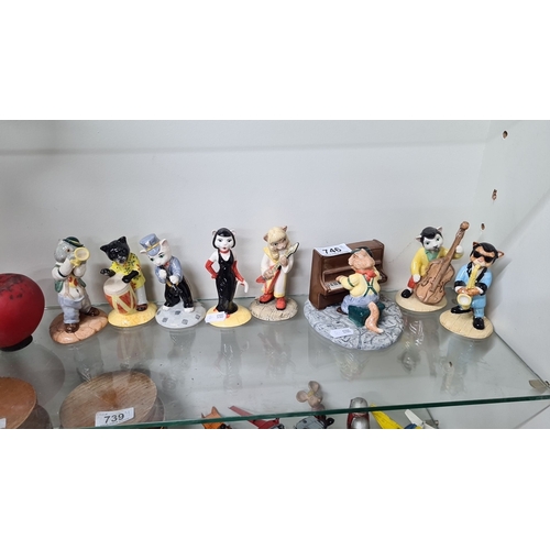 746 - A collection of eight Beswick ceramic cat musician figurines, marked 