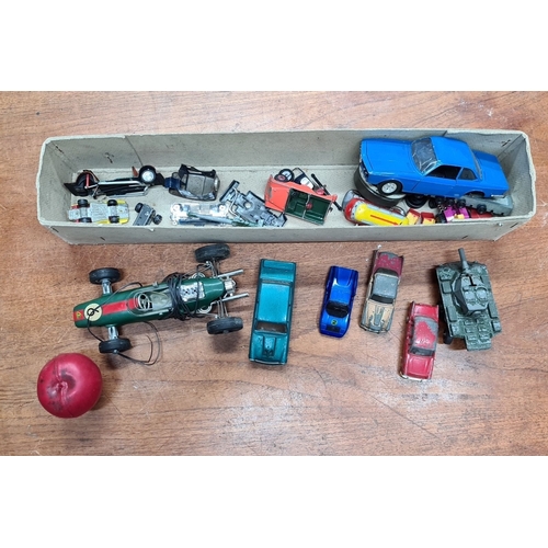 763 - A selection of nine vintage toy cars including a green Schuco Lotus Formula 1 (#1079), a tank, class... 