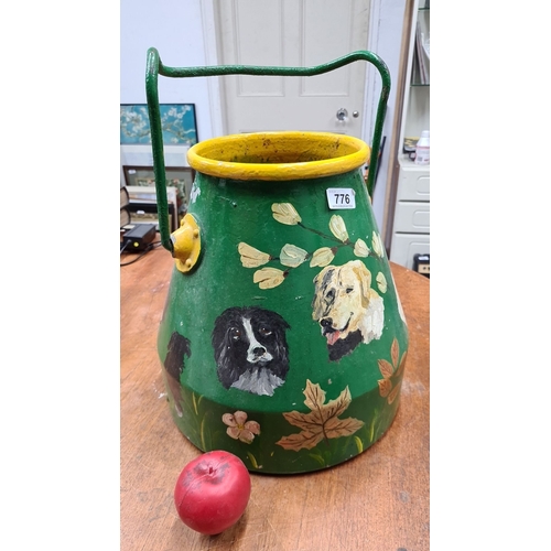 776 - A heavy hand-painted galvanized metal milking bucket featuring dog portraits and floral motifs, with... 