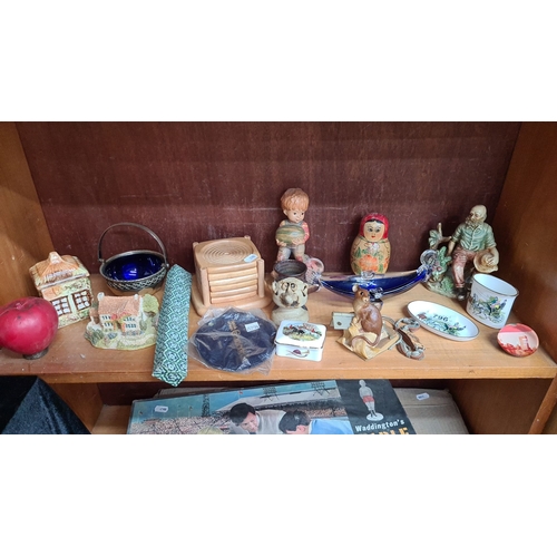 796 - A full shelf of assorted ceramics and collectibles including Concorde item.