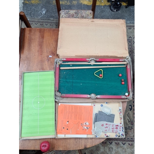 797 - Two vintage children's games including a Wooden Billiard Table Game and Waddington's Table Soccer, c... 