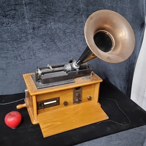 805 - An Oak Edison-style cylinder phonograph by Daklin Museum Series, featuring a large brass horn, hand-... 