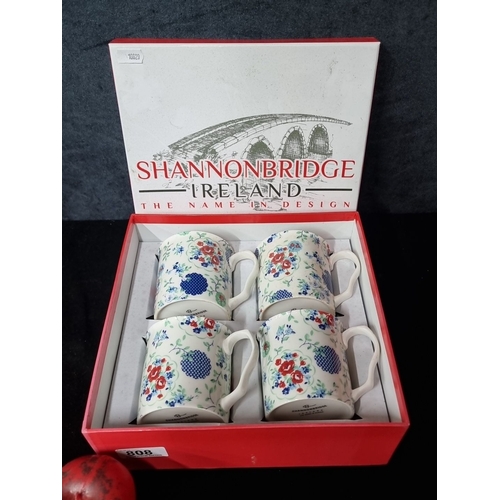 808 - A boxed set of four Shannonbridge Ireland floral porcelain mugs.