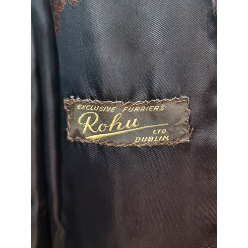 812 - Vintage Rohu Ltd Dublin fur coat, mid-length, in brown with a satin lining. Label reads 