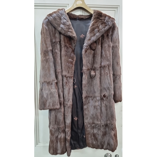 812 - Vintage Rohu Ltd Dublin fur coat, mid-length, in brown with a satin lining. Label reads 