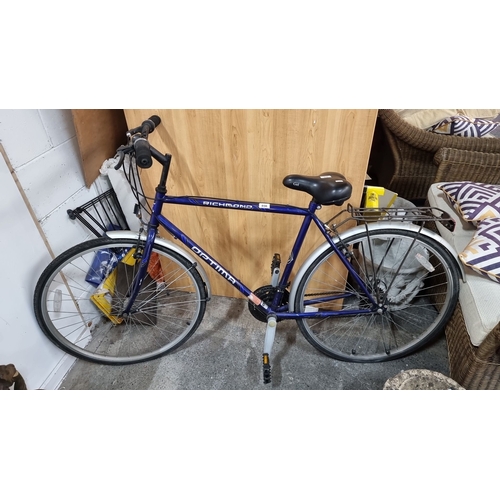 856 - Optima Richmond large gents  bicycle, featuring a blue frame, gel seat, rear carrier, and standard r... 