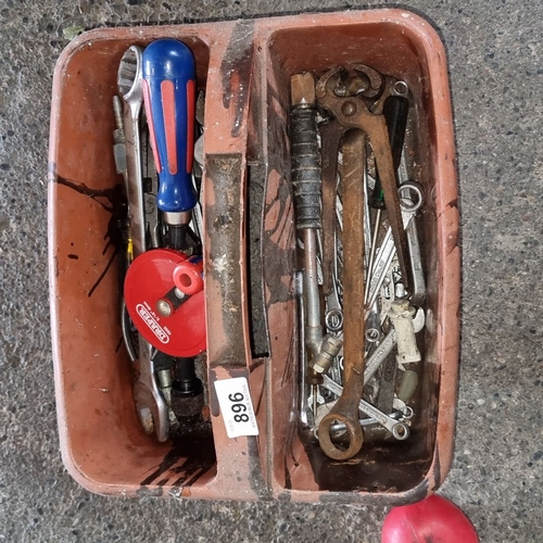 896 - A selection of hand tools including wrenches, screwdrivers, and a measuring tape in a plastic toolbo... 