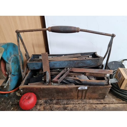 901 - A vintage metal hand held tool box containing a mixed assortment of tools including set squares, spi... 