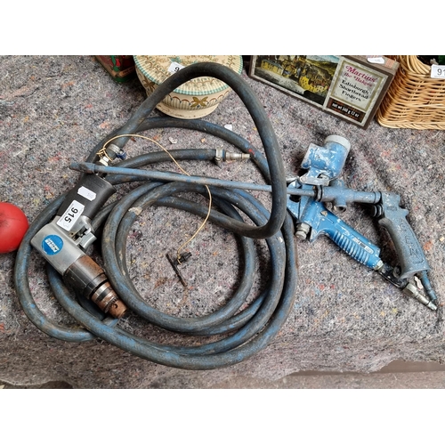 915 - Three DIY items including a PowerCraft reversible air drill kit, along with two spray guns.