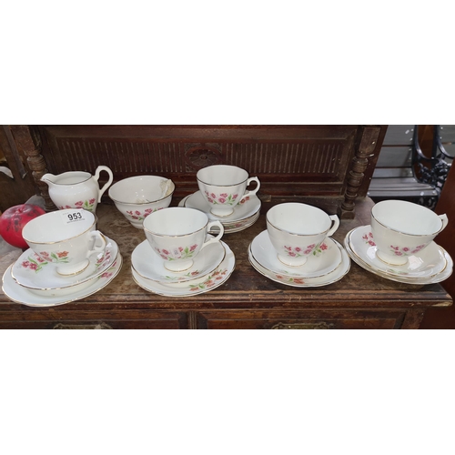 953 - A very pretty 19 piece Regina Fine Bone China set. Including cups, saucers and milk jug.