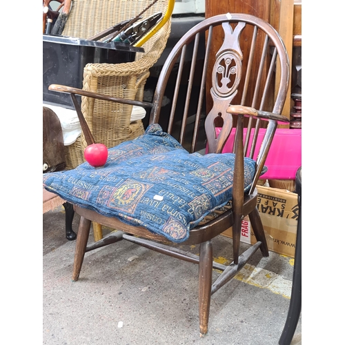 958 - A charming vintage ERCOL style armchair with nice aged patina to wood, with spring suspension.