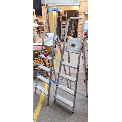 964 - Two aluminium standard size five step - step ladders.