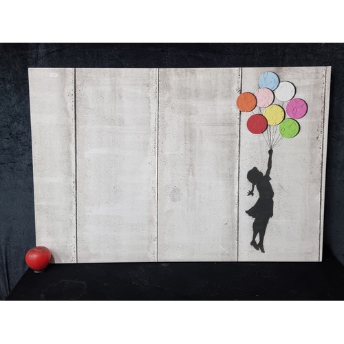 837 - A large print on canvas after an original Banksy painting titled 'Flying Balloon Girl'. 
Flying Ball... 