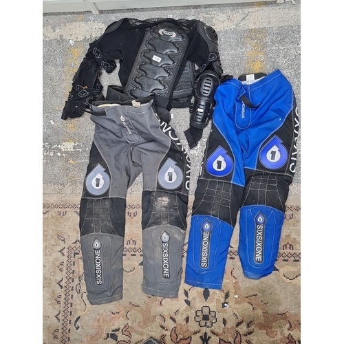 712 - A collection of SIXSIXONE protective gear including pants and body armor, made of 88% nylon and 12% ... 