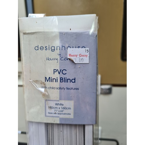 303 - A brand new PVC white mini blind by Design House for Harry Corry with child safety features. Size 18... 