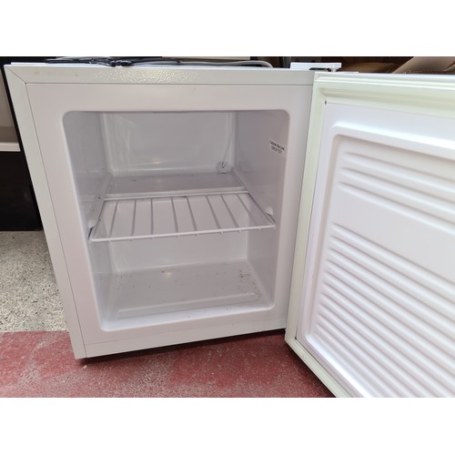 321 - A neat table top freezer Model no. MVRDD105. Similar model RRP £115 on argos.co.uk.