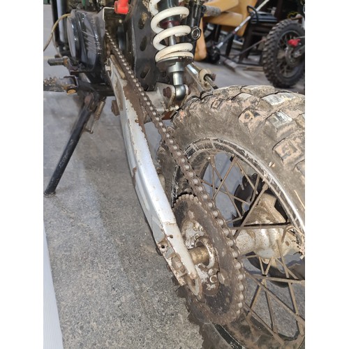 649 - Star Lot: M2R KX110 dirt bike with off-road tires and manual pedals. Petrol engine.  Unchecked.